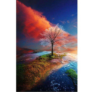 Herbstbaum Diamond Painting mit blau-orangem Himmel