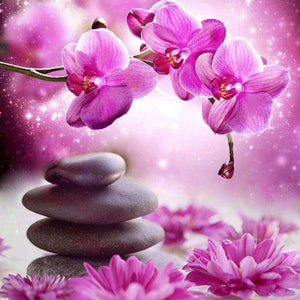 Rosa Orchideen und Zen-Steine - Diamond Painting Blumenmotiv